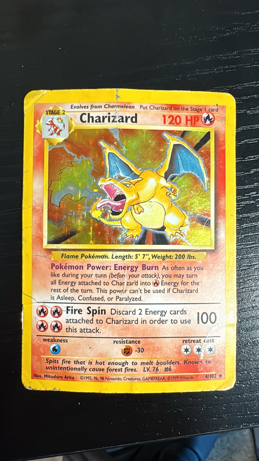 Base set unlimited Charizard DMG 4/102